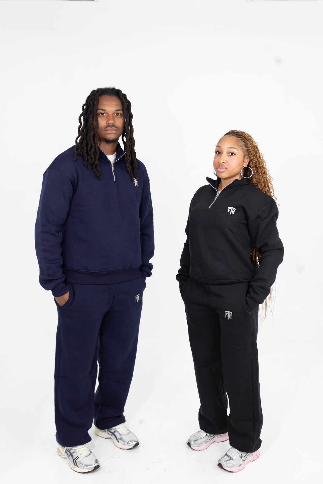 For The Riches navy blue quarter zip and pants set — front campaign view